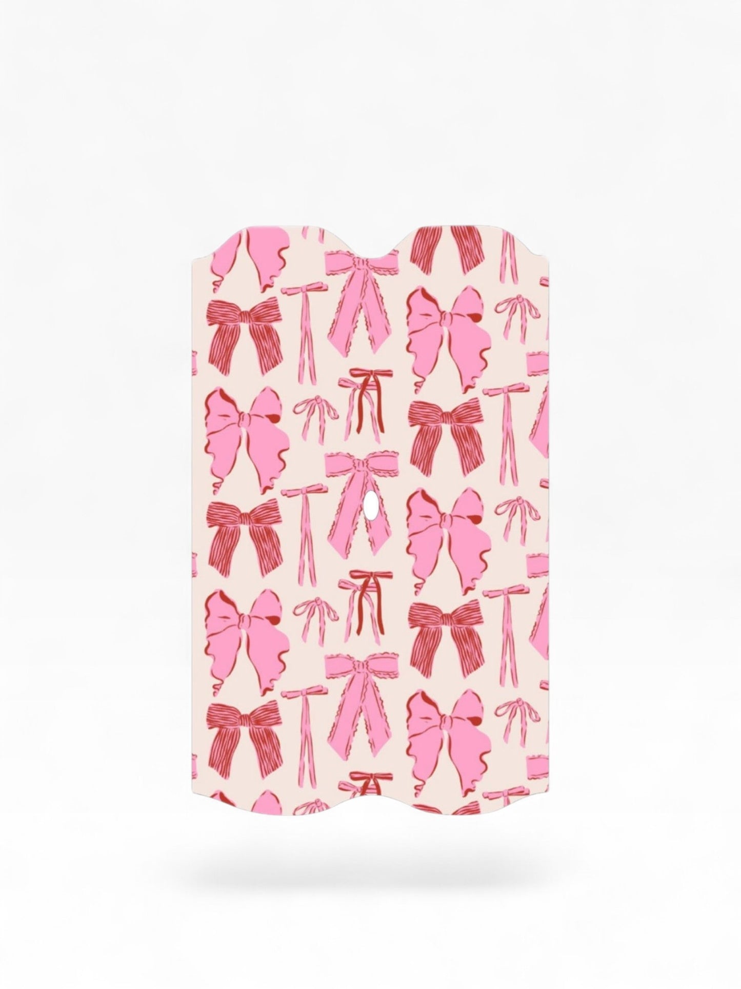 Cloud Skinz waterproof Vuse Alto decal featuring a cute pink and red bow pattern on a light background