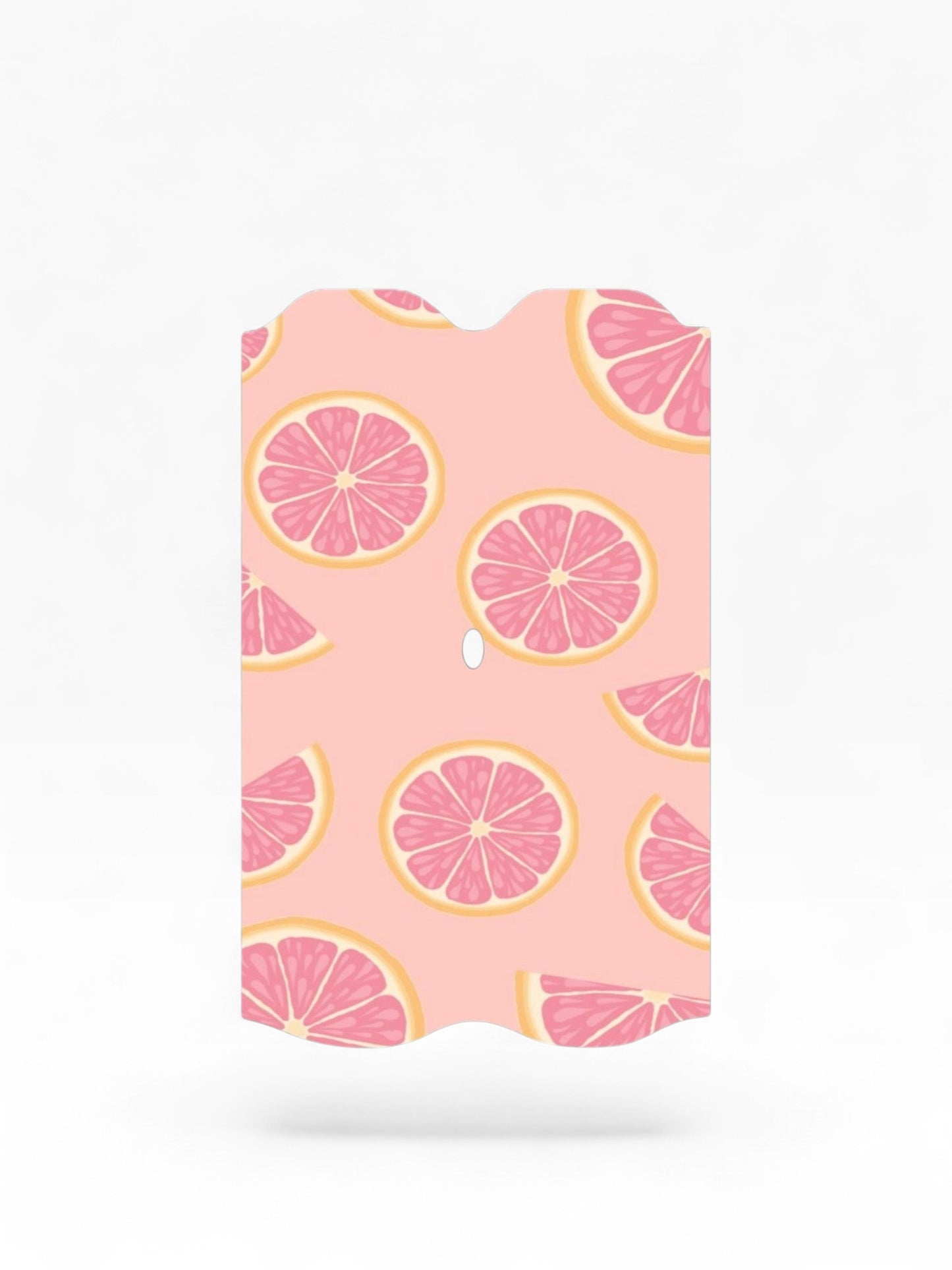 Cloud Skinz waterproof Vuse Alto decal featuring a pink grapefruit slice pattern on a soft peach background.