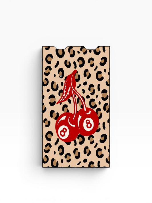 Cloud Skinz waterproof vinyl Juul vape decal featuring a red cherry eight ball design on a leopard print background.