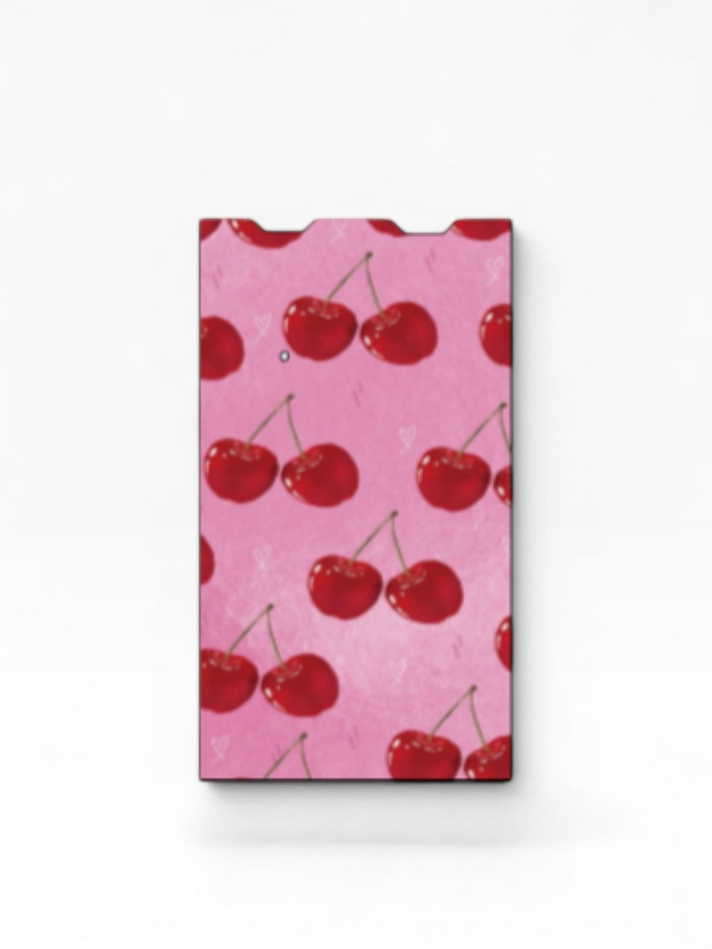 Cloud Skinz waterproof vinyl Juul vape decal featuring a vibrant pink background with a red cherry pattern.