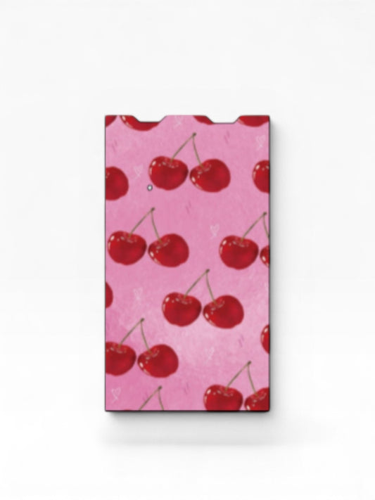 Cloud Skinz waterproof vinyl Juul vape decal featuring a vibrant pink background with a red cherry pattern.