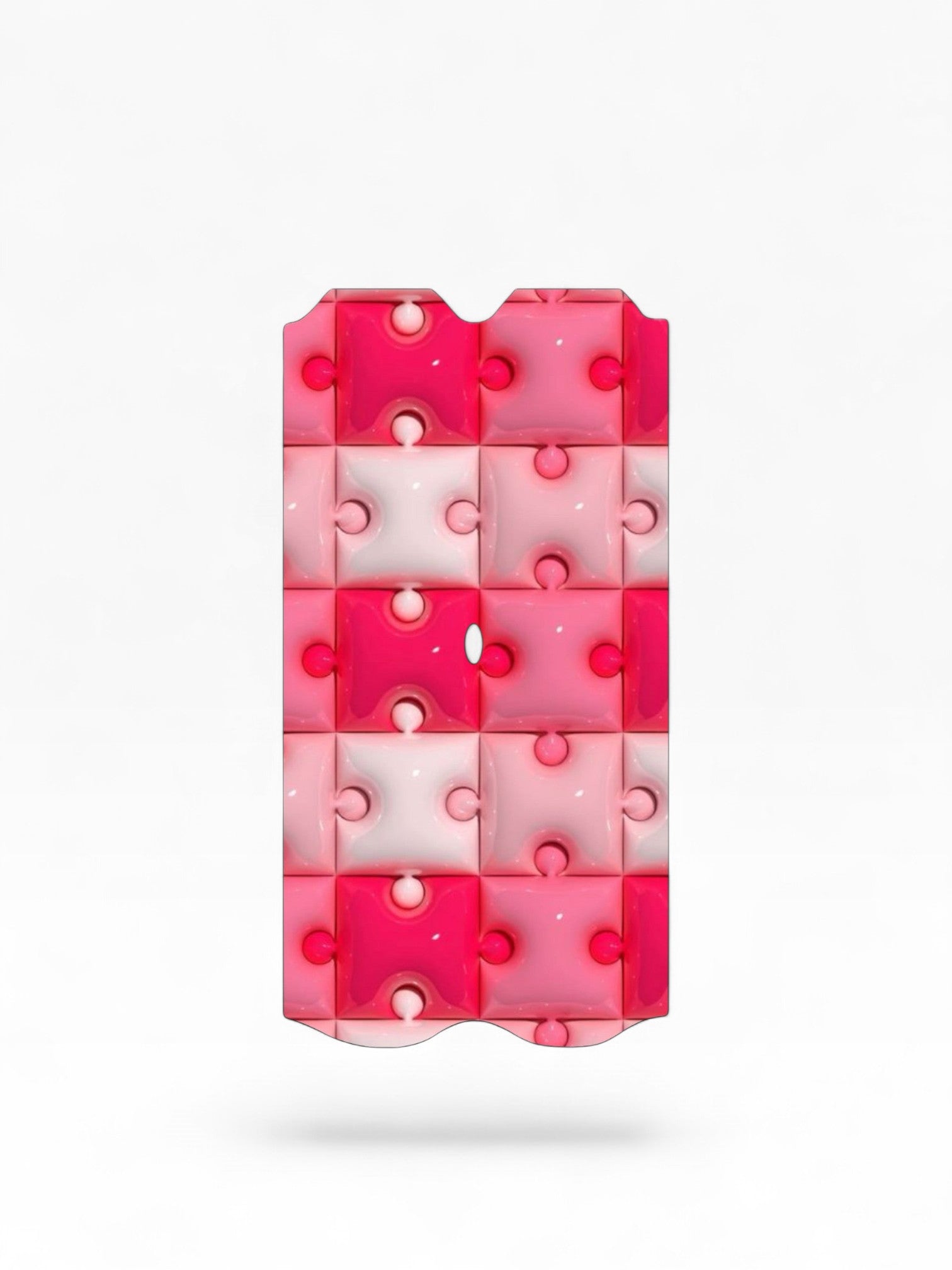 Cloud Skinz waterproof Vuse Alto decal featuring a glossy pink and white puzzle piece pattern.