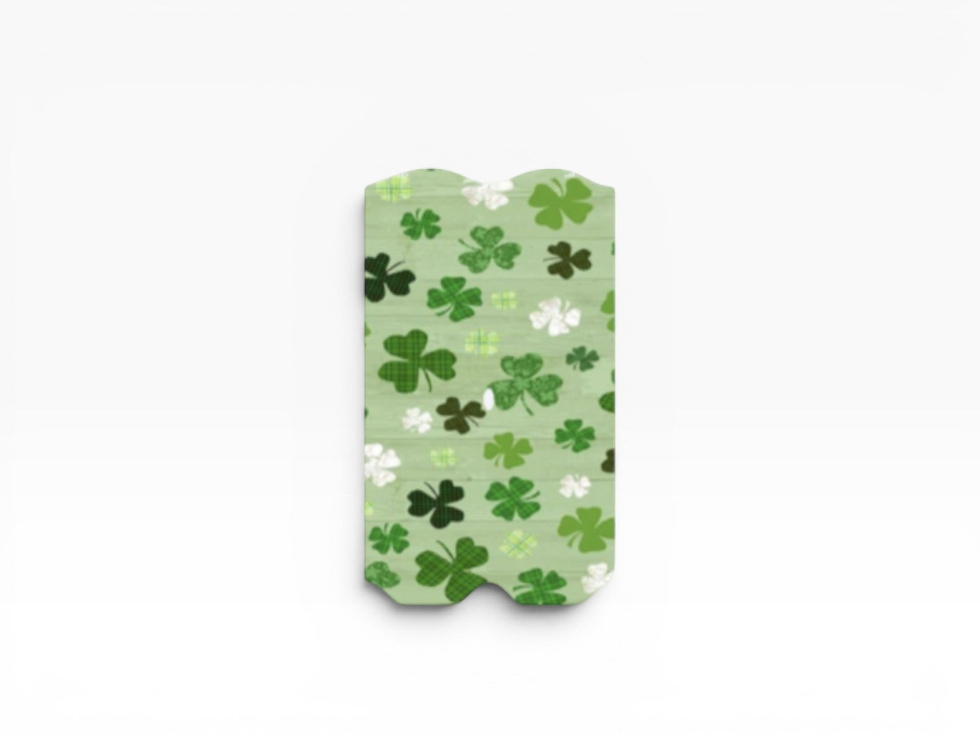 Cloud Skinz St. Patrick's Day vape decal featuring a green plaid pattern with white and dark green clover shamrocks.