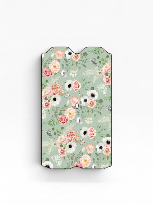 Cloud Skinz waterproof vinyl decal for Vuse vape featuring a sage green background with pink and white floral pattern.