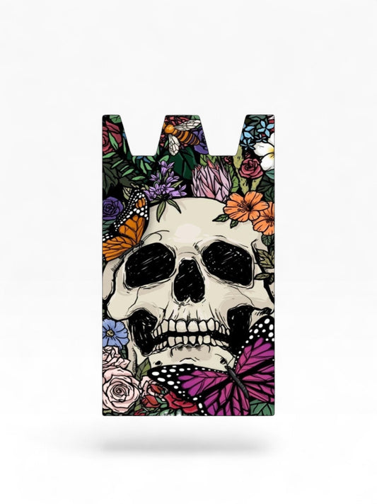 Cloud Skinz waterproof Stiiizy wrap featuring a skull surrounded by colorful flowers, butterflies, and a bee.