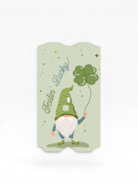 Cloud Skinz St. Patrick's Day vape decal featuring a cute gnome holding a four-leaf clover on a light green background.