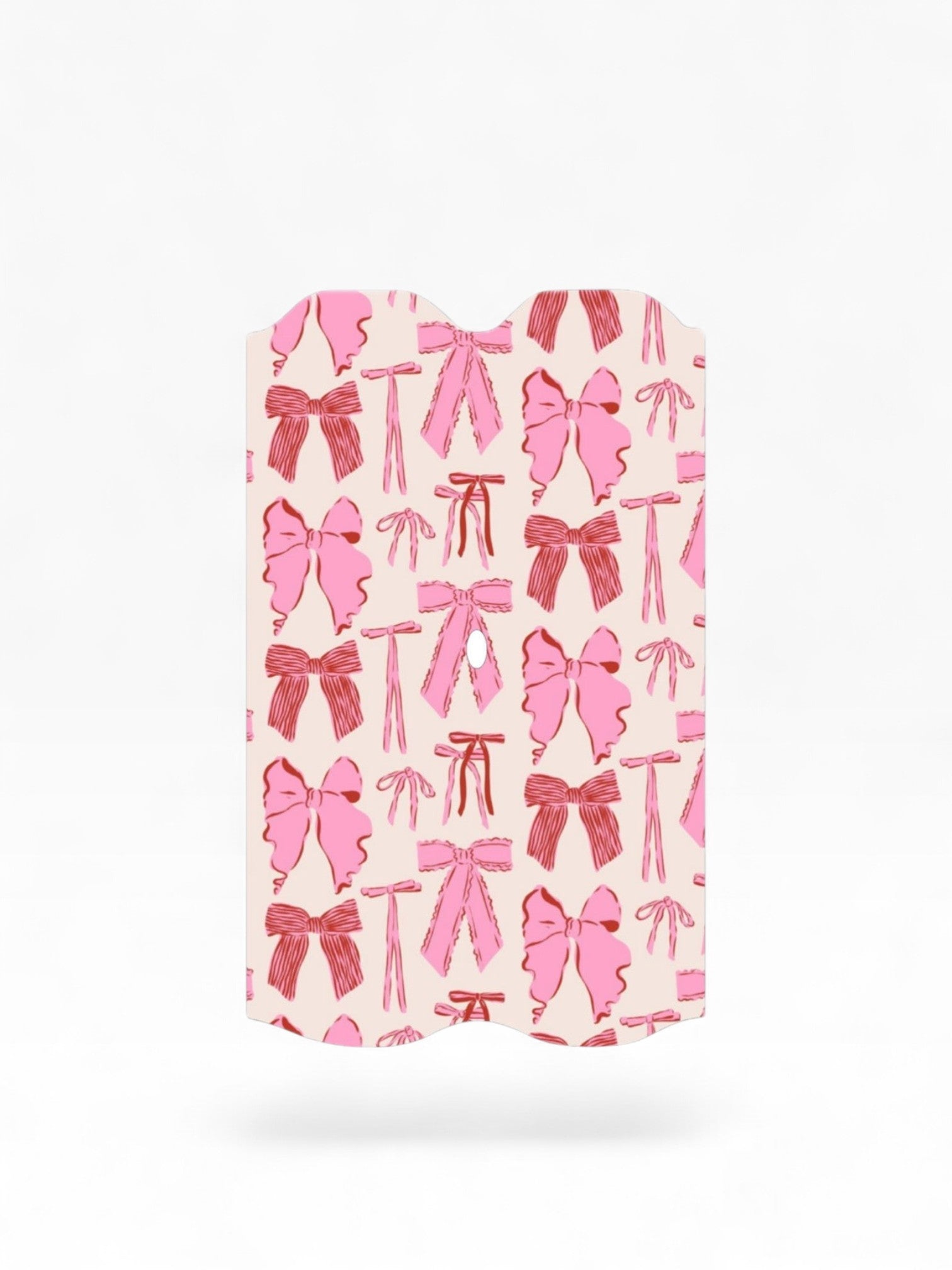 Cloud Skinz waterproof Vuse Alto decal featuring a cute pink and red bow pattern on a light background