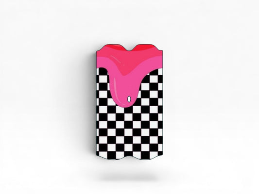 Cloud Skinz waterproof Vuse Alto decal featuring a black and white checkered pattern with pink dripping paint design.