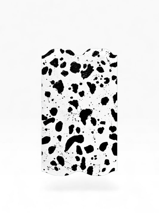 Cloud Skinz waterproof Vuse Alto decal featuring a black and white dalmatian-style paint splatter pattern