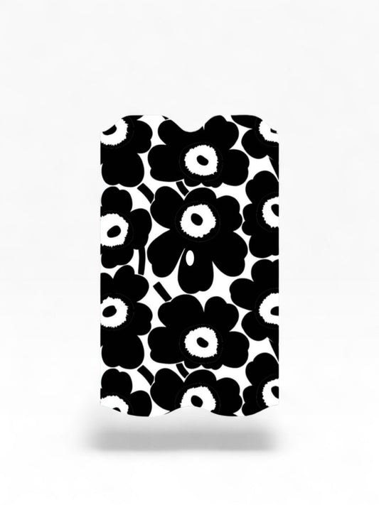 Cloud Skinz waterproof decal for Vuse Alto featuring a black and white floral pattern for device protection.