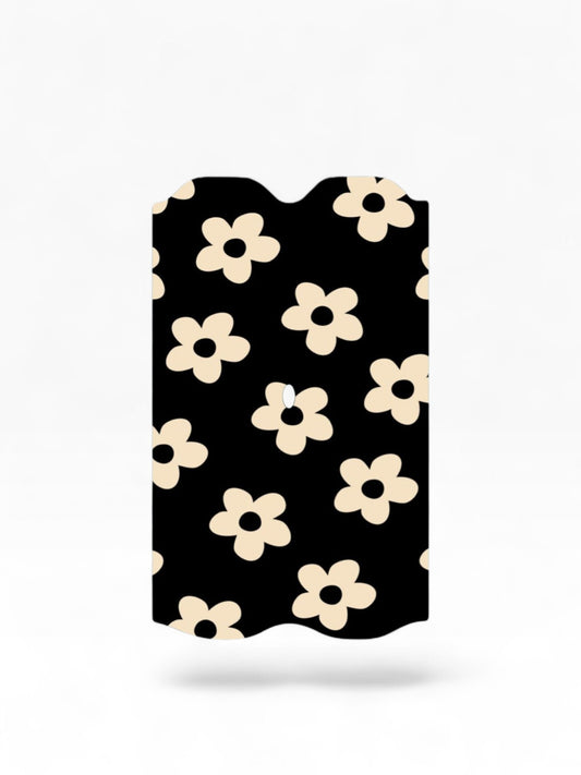 Cloud Skinz waterproof Vuse Alto decal featuring a black background with a cream-colored retro flower pattern.
