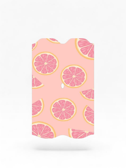 Cloud Skinz waterproof Vuse Alto decal featuring a pink grapefruit slice pattern on a soft peach background.