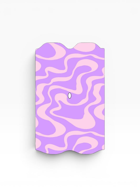 Cloud Skinz waterproof decal for Vuse Alto featuring a purple and light pink wavy retro swirl pattern